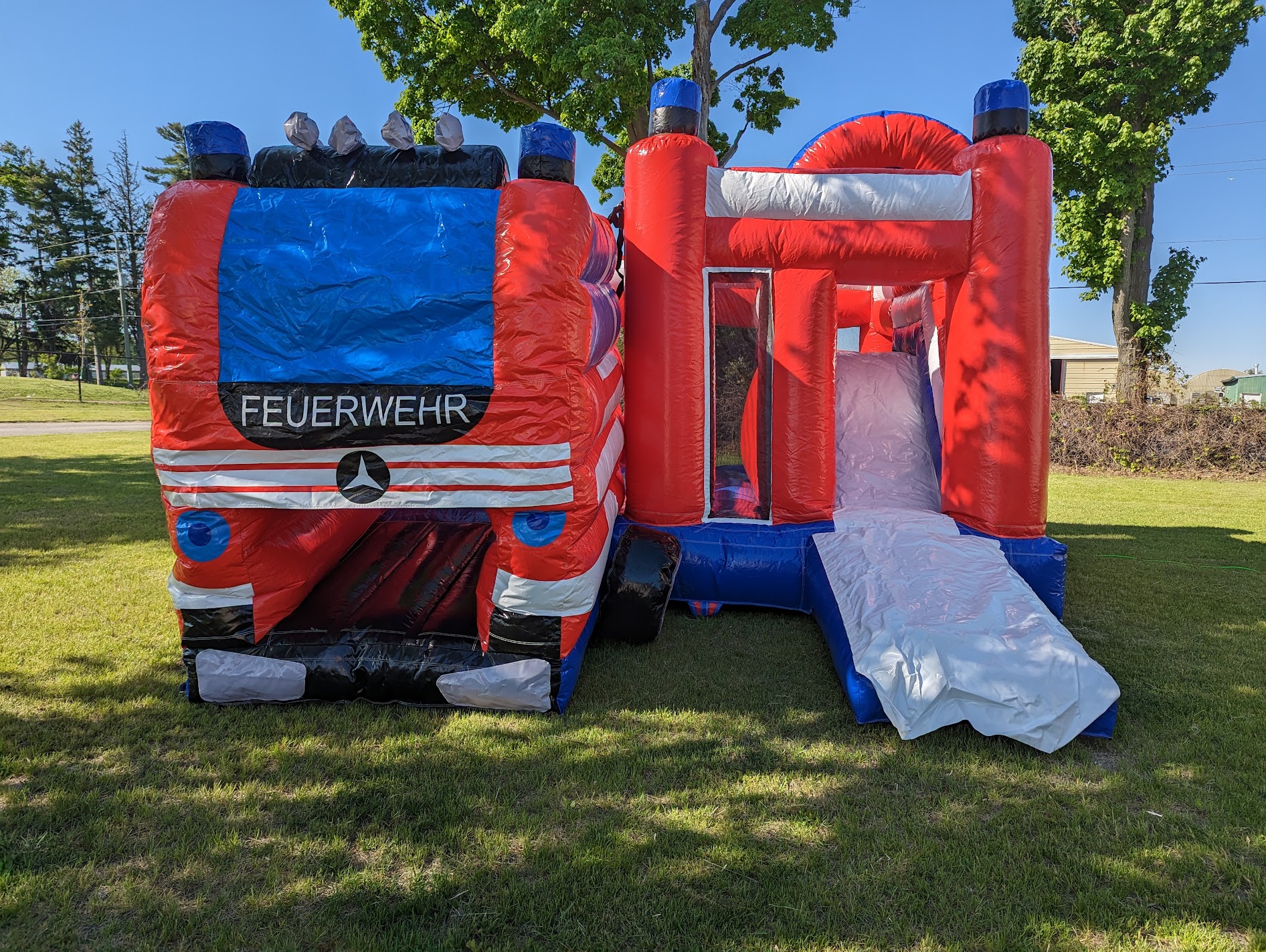 Firetruck bouncy castle with slide